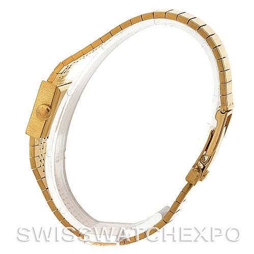 The side view of the Vintage Patek Philippe watch shows the bracelet, clasp, and side of the case in a gold finish.