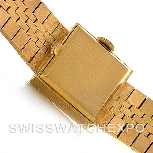 This image shows the back view and part of the gold bracelet of a Vintage Patek Philippe watch.