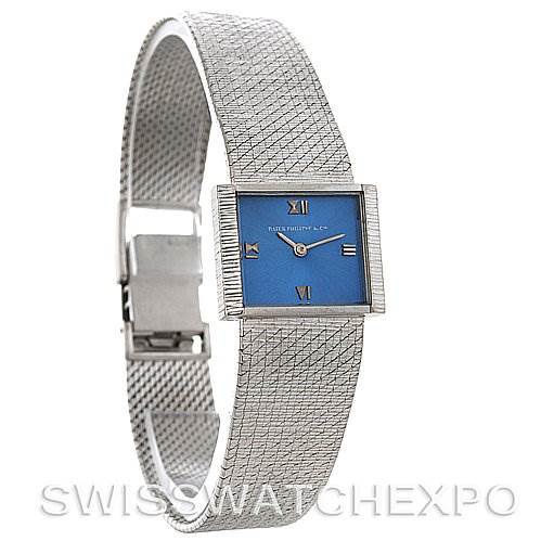 This image shows a side angle view of the Vintage Patek Philippe watch, highlighting its blue dial and metallic mesh band.