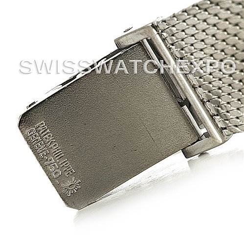 The image shows a close-up of the clasp and metal bracelet of a Vintage Patek Philippe watch.