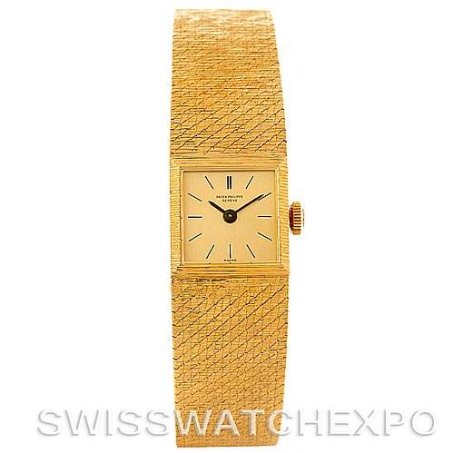 This is a frontal view of a Vintage Patek Philippe watch showing the dial, crown, and textured bracelet.