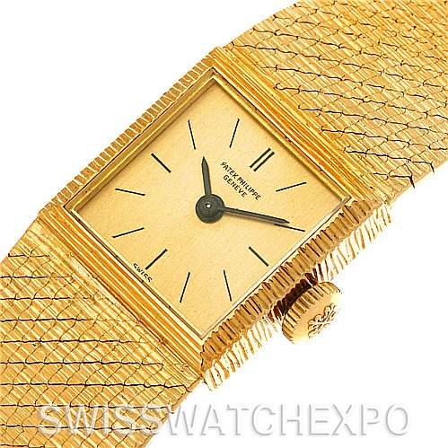 This image displays a Patek Philippe Vintage 3285/50 Women's Yellow Gold Champagne Dial 3285/50 Women's Yellow Gold Champagne Dial model watch from an angled top view, showing its rectangular gold face, dial, and textured gold band.