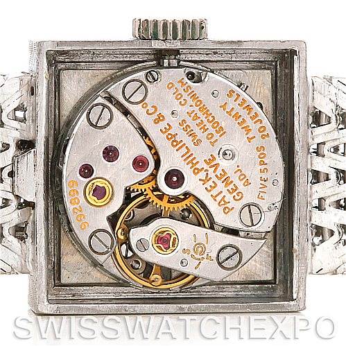 The image shows the movement and internal mechanism of a Vintage Patek Philippe watch, viewed from the back with the case removed.