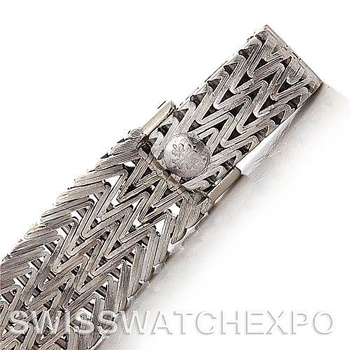 The image shows a close-up view of the bracelet and clasp of a Vintage Patek Philippe watch.