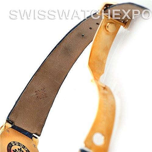 The image shows a partial view of the strap and clasp of the Patek Philippe 4890 Women's Yellow Gold White Dial 4890 Women's Yellow Gold White Dial 18k Yellow Gold Ladies Watch 4890 model from a side angle.