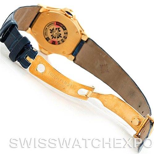 The image shows the back and clasp of a Patek Philippe 4890 Women's Yellow Gold White Dial 4890 Women's Yellow Gold White Dial 4890 18k Yellow Gold Ladies Watch at an angle.