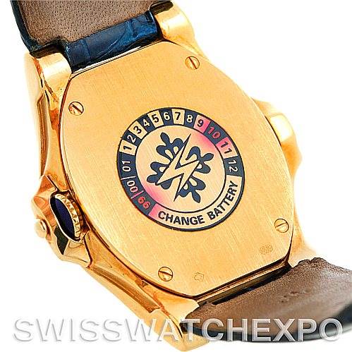 This image shows the case back and part of the leather strap of the Patek Philippe 4890 Women's Yellow Gold White Dial 4890 Women's Yellow Gold White Dial 18K Yellow Gold Ladies Watch 4890 model.