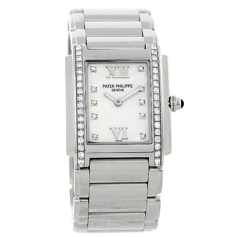 This image shows a front view of the Patek Philippe Twenty-4 4910/10A-011 Women's Stainless Steel Silver Dial 4910/10A-011 Women's Stainless Steel Silver Dial watch, highlighting its rectangular face and diamond accents.