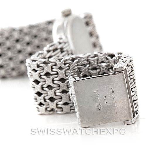 This image shows a close-up of the mesh bracelet and clasp of a Vintage Patek Philippe watch from an angle that highlights the texture and detail.