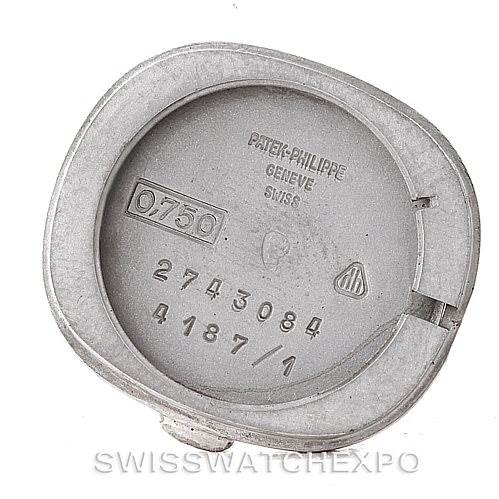 The image shows the back case of a Vintage Patek Philippe watch, showcasing its internal markings and serial numbers.