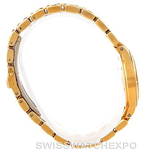 The image shows a side view of the Patek Philippe Neptune 4881 Women's Yellow Gold Beige Dial 4881 Women's Yellow Gold Beige Dial model, highlighting its gold bracelet and case profile.