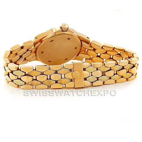 The image shows the back and bracelet of a Patek Philippe Neptune 4881 Women's Yellow Gold Beige Dial 4881 Women's Yellow Gold Beige Dial watch in gold.