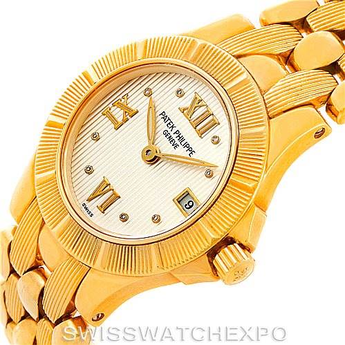 The image shows a side and partial top view of the Patek Philippe Neptune 4881 Women's Yellow Gold Beige Dial 4881 Women's Yellow Gold Beige Dial model watch, highlighting its gold case and bracelet.