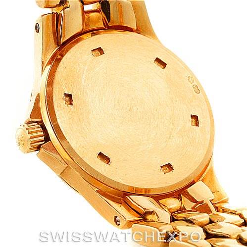 The image shows the back case and part of the bracelet of a Patek Philippe Neptune 4881 Women's Yellow Gold Beige Dial 4881 Women's Yellow Gold Beige Dial model watch in a gold finish.