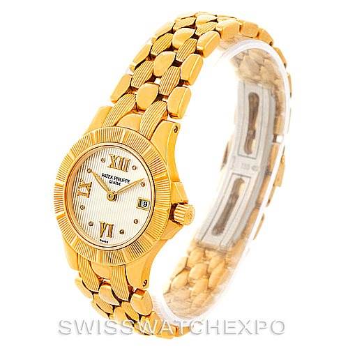 The image shows a front-angle view of a Patek Philippe Neptune 4881 Women's Yellow Gold Beige Dial 4881 Women's Yellow Gold Beige Dial model watch, highlighting its gold case, bezel, bracelet, and dial.