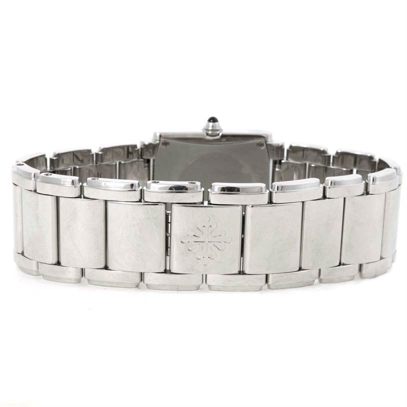 The image shows the stainless steel bracelet and case back of a Patek Philippe Twenty-4 4910/10A-011 Women
s Stainless Steel Silver Dial 4910/10A-011 Women
s Stainless Steel Silver Dial watch from a rear angle.
