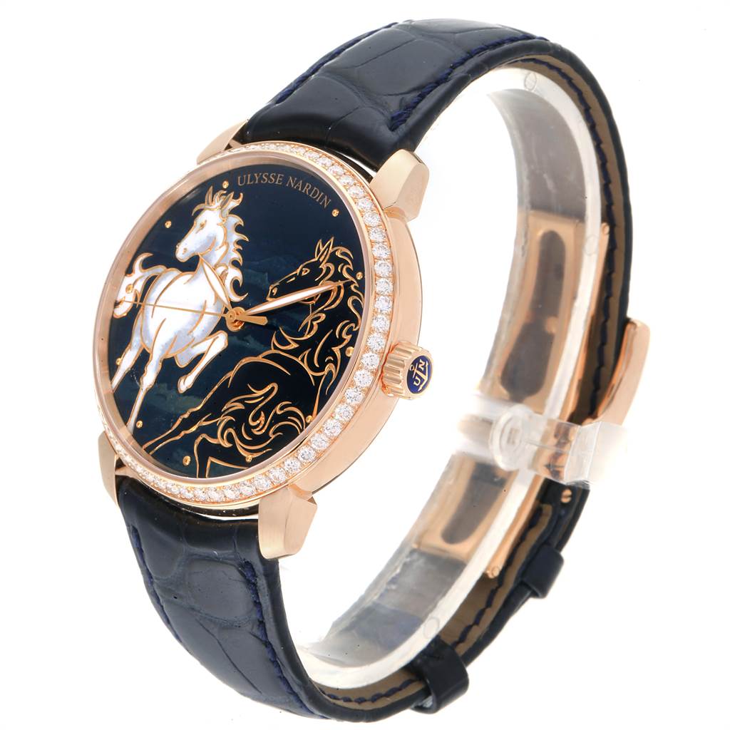 This Ulysse Nardin Classico 8156-111-B-2 Men
s Rose Gold Blue Dial 8156-111-B-2 Men
s Rose Gold Blue Dial watch is shown at an angle displaying the face, dial, and leather strap.