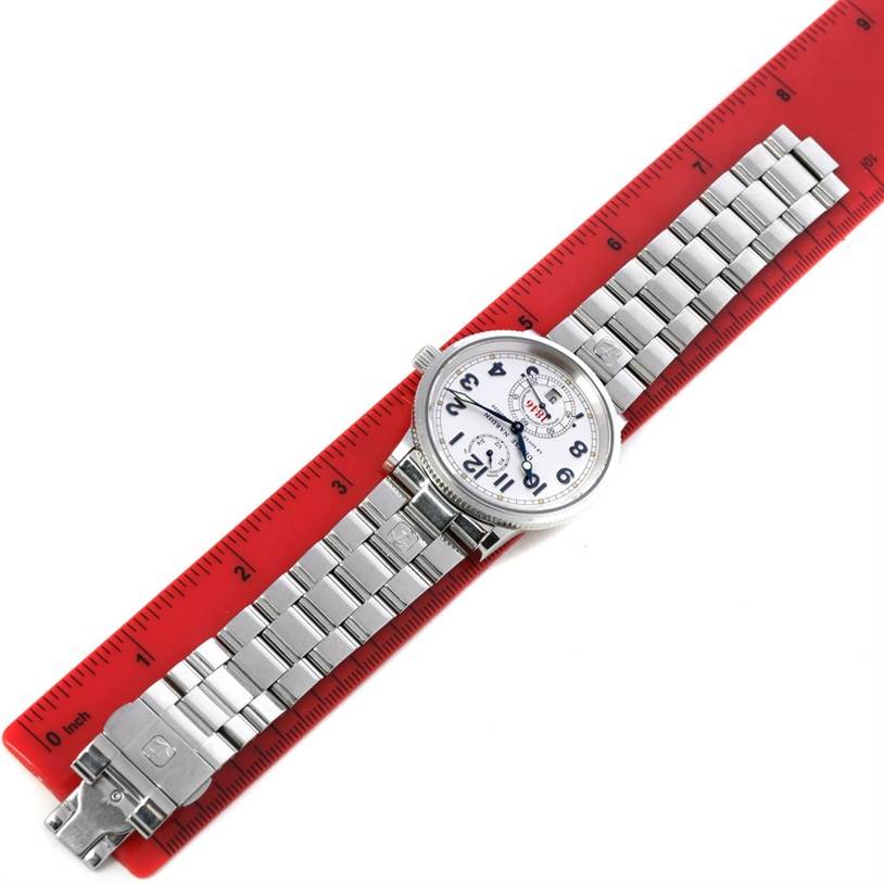 The Ulysse Nardin Marine 263 - 22 Men's Stainless Steel Silver Dial 263 - 22 Men's Stainless Steel Silver Dial model watch is shown from a top-down angle, with a bracelet and clasp fully visible on a red ruler.