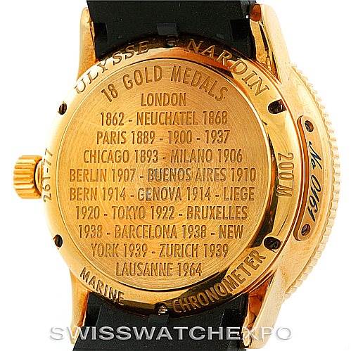 The image shows the back case of a Ulysse Nardin Marine 261-77-3 Men's Yellow Gold Silver Dial 261-77-3 Men's Yellow Gold Silver Dial watch, highlighting the engraved awards and model details.