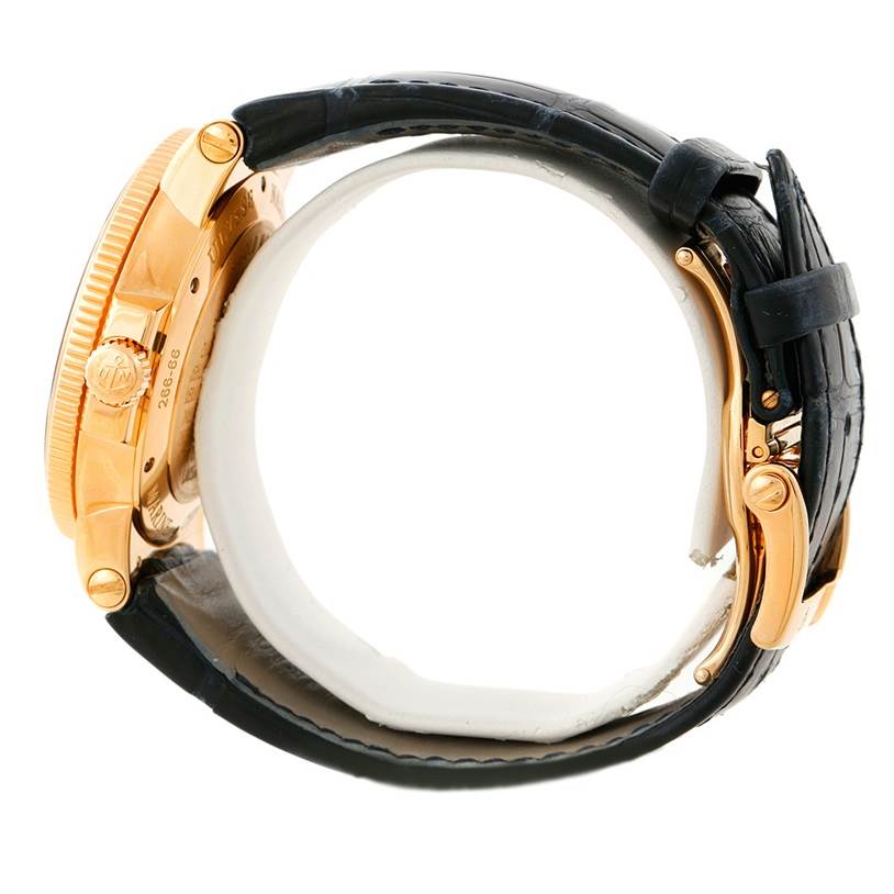 The image shows a side view of the Ulysse Nardin Marine 266-66 Men's Rose Gold Blue Dial 266-66 Men's Rose Gold Blue Dial watch, focusing on the case, crown, and black leather strap with a clasp.