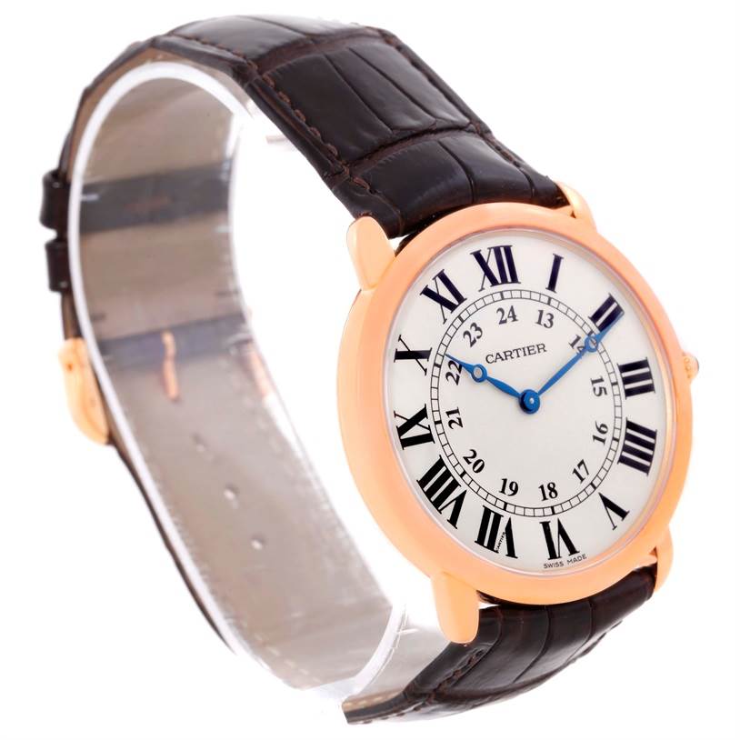 The image shows a Ronde model by Cartier, angled to display its dial and part of its leather strap.