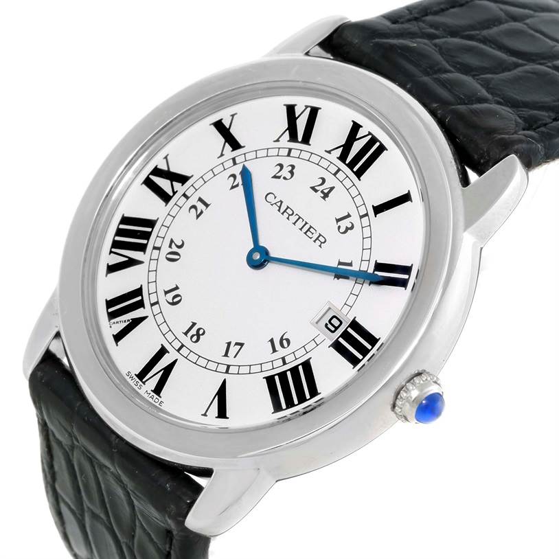 The Cartier Ronde W6700255 Stainless Steel Silver Dial W6700255 Stainless Steel Silver Dial watch is shown at a slight angle, highlighting its Roman numeral dial, black leather strap, and blue cabochon crown.
