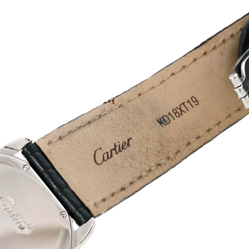 This image shows the backside and partial strap of a Cartier Ronde W6700255 Stainless Steel Silver Dial W6700255 Stainless Steel Silver Dial watch, focusing on the leather strap with brand markings visible.