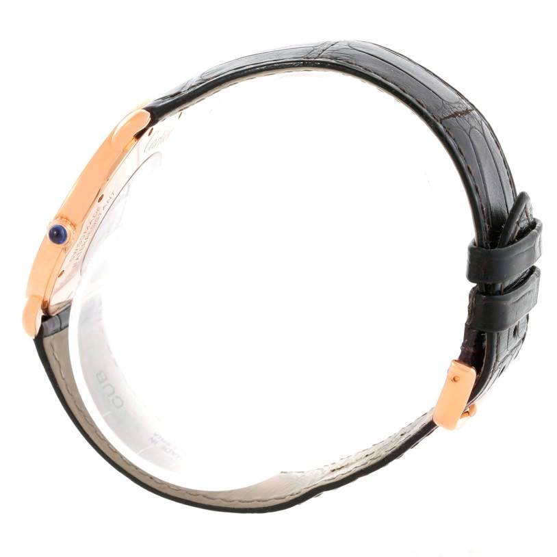 The image shows a side view of the Cartier Ronde W6800251 Men
s Rose Gold Silver Dial W6800251 Men
s Rose Gold Silver Dial watch, highlighting the strap, buckle, and crown with a blue cabochon.