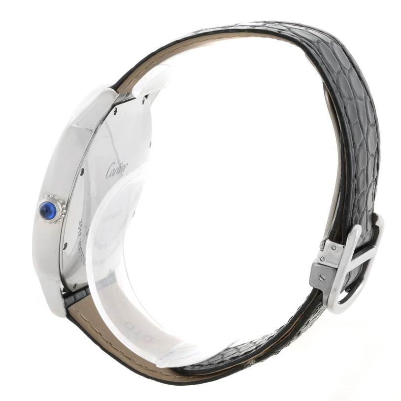 The Ronde model by Cartier is shown from a side angle, displaying its strap, buckle, and side profile.