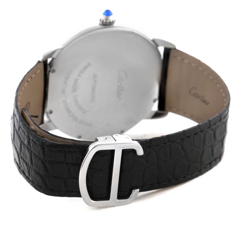 The image shows the back view of a Ronde model Cartier watch, including the case back, leather strap, and Cartier clasp.