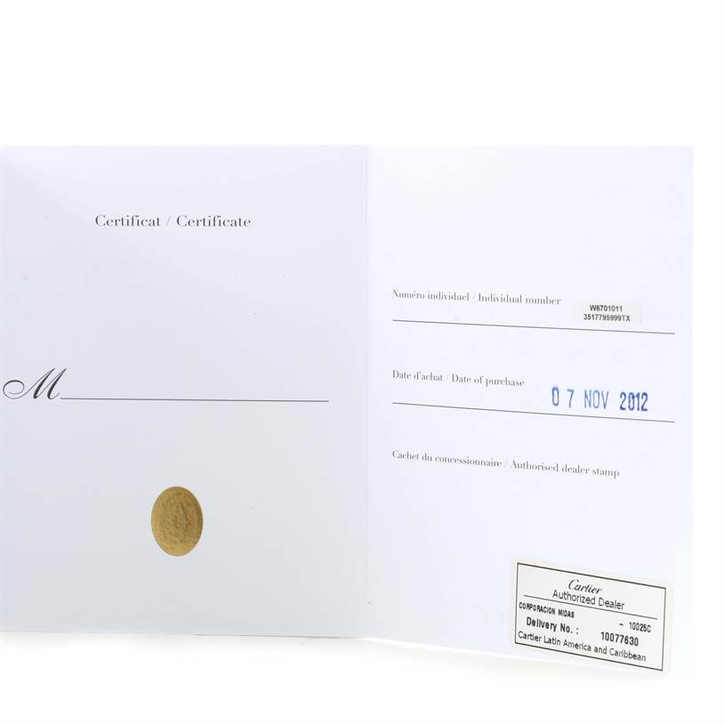 The image shows the warranty card for the Ronde model by Cartier, with purchase details and an authorized dealer stamp.