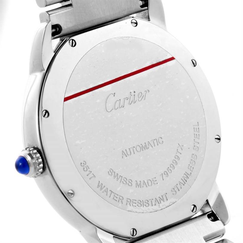 The image shows the back casing and part of the strap of a Cartier Ronde W6701011 Men's Stainless Steel Silver Dial W6701011 Men's Stainless Steel Silver Dial watch, revealing the brand engraving and specifications.