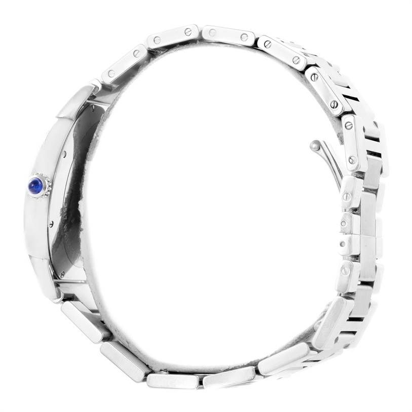 This side view image shows the Cartier Ronde W6701011 Men's Stainless Steel Silver Dial W6701011 Men's Stainless Steel Silver Dial watch case, crown with blue cabochon, and metal bracelet.
