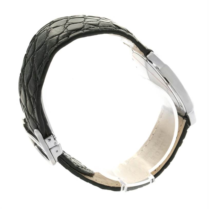 The image shows a side angle of the Cartier Ronde W6700255 Men's Stainless Steel Silver Dial W6700255 Men's Stainless Steel Silver Dial watch, highlighting its leather strap and metal buckle.