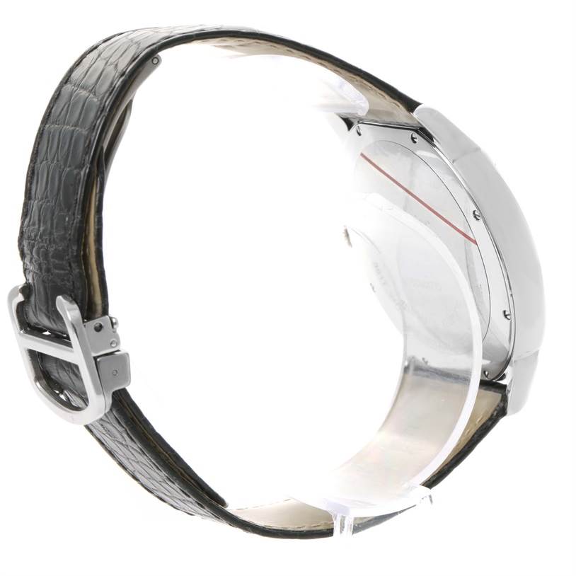 The image shows the side view and back case of a Ronde model watch by Cartier, alongside its strap and buckle.