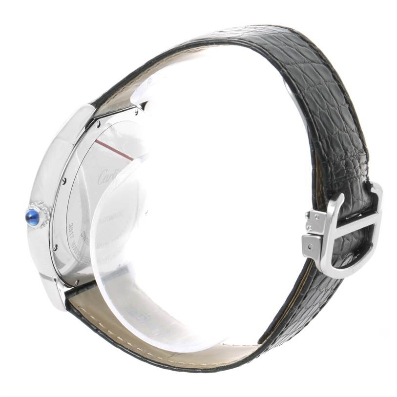 The image shows a side view of a Cartier Ronde W6701010 Men
s Stainless Steel Silver Dial W6701010 Men
s Stainless Steel Silver Dial watch highlighting its black leather strap, buckle, case back, and blue cabochon crown.