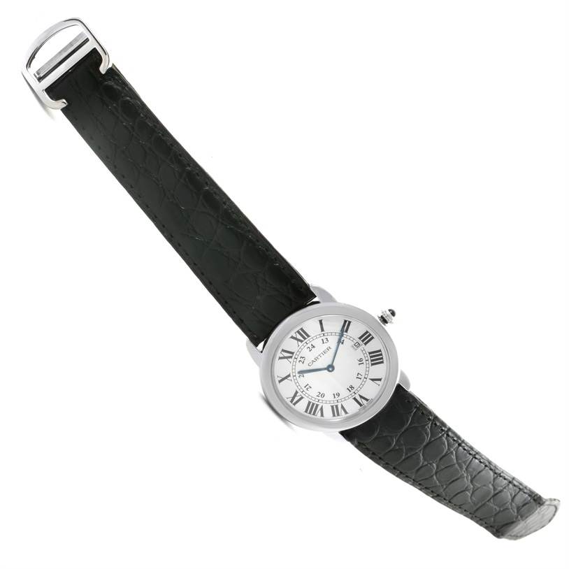 This image shows the Cartier Ronde W6700255 Stainless Steel Silver Dial W6700255 Stainless Steel Silver Dial model watch at an angled top view, highlighting the watch face and black leather strap.