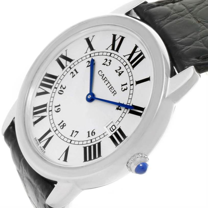 The Cartier Ronde W6700255 Stainless Steel Silver Dial W6700255 Stainless Steel Silver Dial watch is pictured at an angle displaying its face, blue hands, and a detailed crown with leather straps.