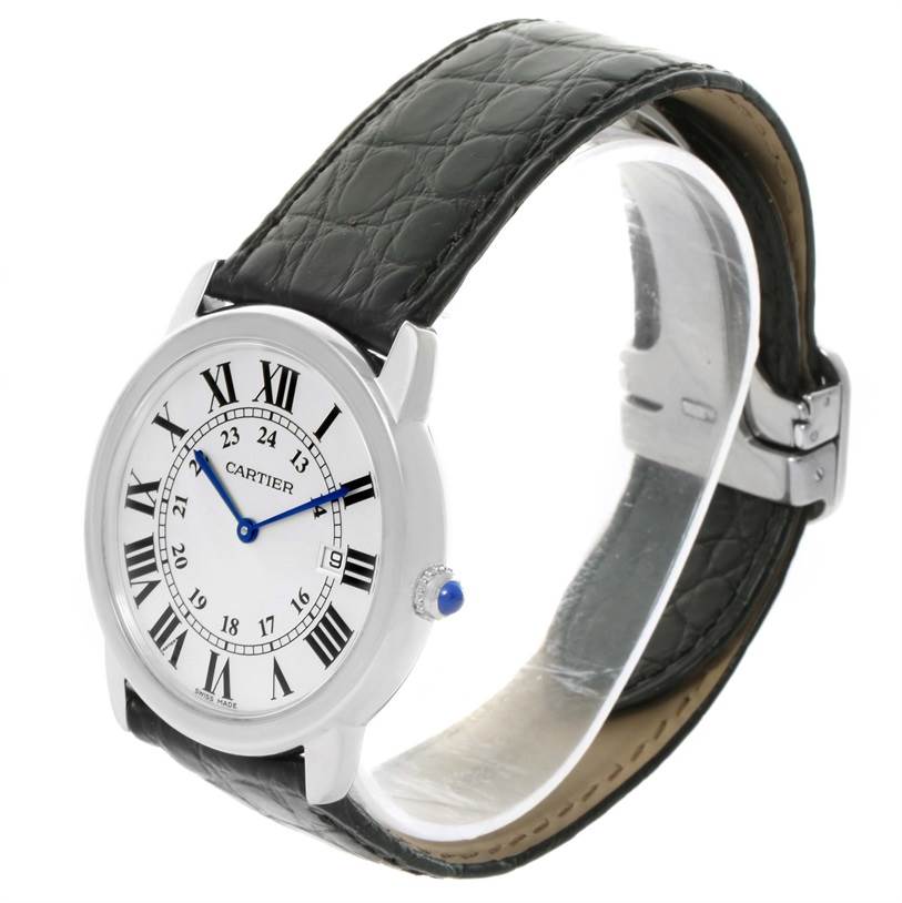 The image shows a side angle of a Cartier Ronde W6700255 Stainless Steel Silver Dial W6700255 Stainless Steel Silver Dial watch highlighting the face, bezel, strap, and crown with a blue cabochon.