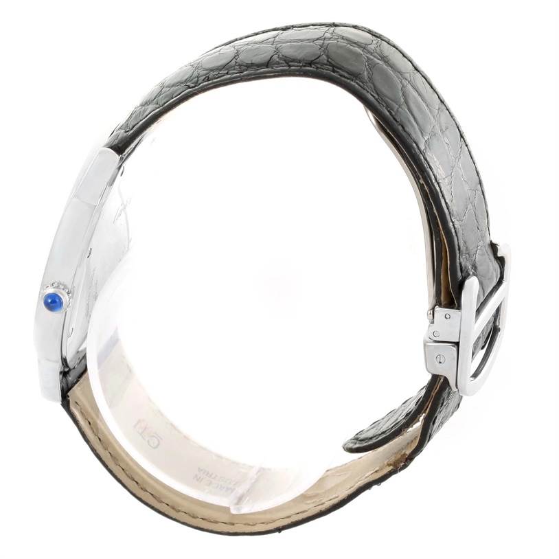 This image shows a side view of the Cartier Ronde W6700255 Stainless Steel Silver Dial W6700255 Stainless Steel Silver Dial watch, highlighting its leather strap and buckle.