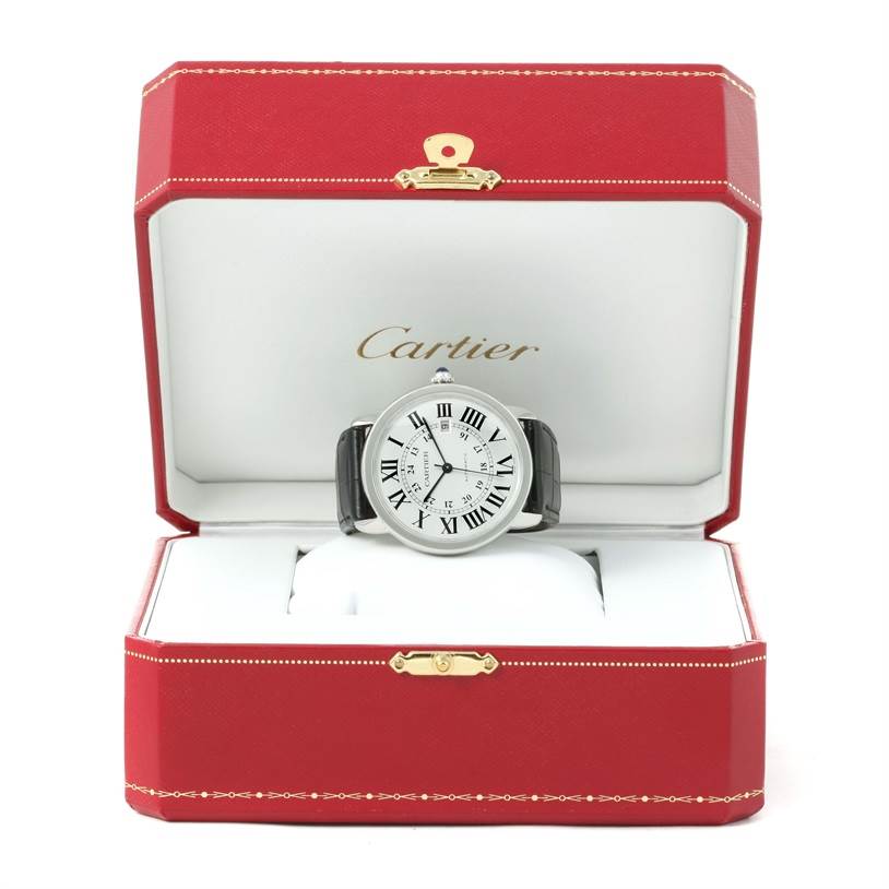 The Cartier Ronde W6701010 Men
s Stainless Steel Silver Dial W6701010 Men
s Stainless Steel Silver Dial model watch is shown from a front angle inside its red and white box.