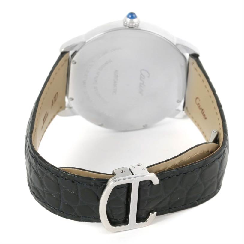 The image shows the back case and leather strap with a buckle of a Ronde model watch by Cartier.