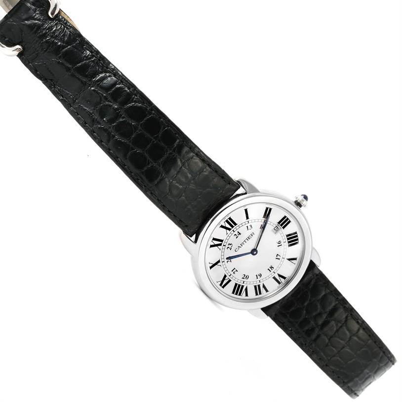 This Cartier Ronde W6700255 Stainless Steel Silver Dial W6700255 Stainless Steel Silver Dial watch is angled slightly to the right, showcasing its black leather strap and white dial with Roman numerals.