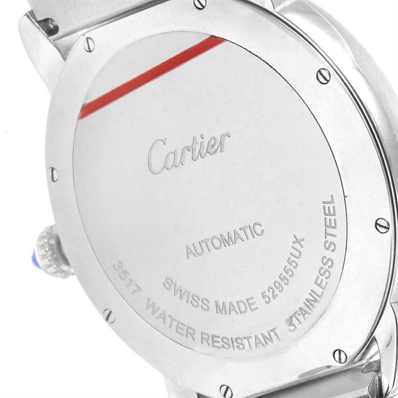 The image shows the back case of a Cartier Ronde W6701011 Men's Stainless Steel Silver Dial W6701011 Men's Stainless Steel Silver Dial watch, indicating it is an automatic, Swiss-made, water-resistant, stainless steel model.