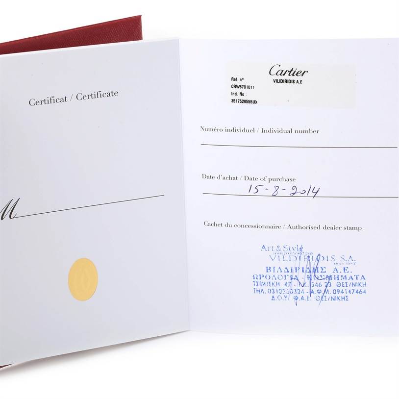 This image shows the certificate and purchase details for a Cartier Ronde W6701011 Men's Stainless Steel Silver Dial W6701011 Men's Stainless Steel Silver Dial model watch.