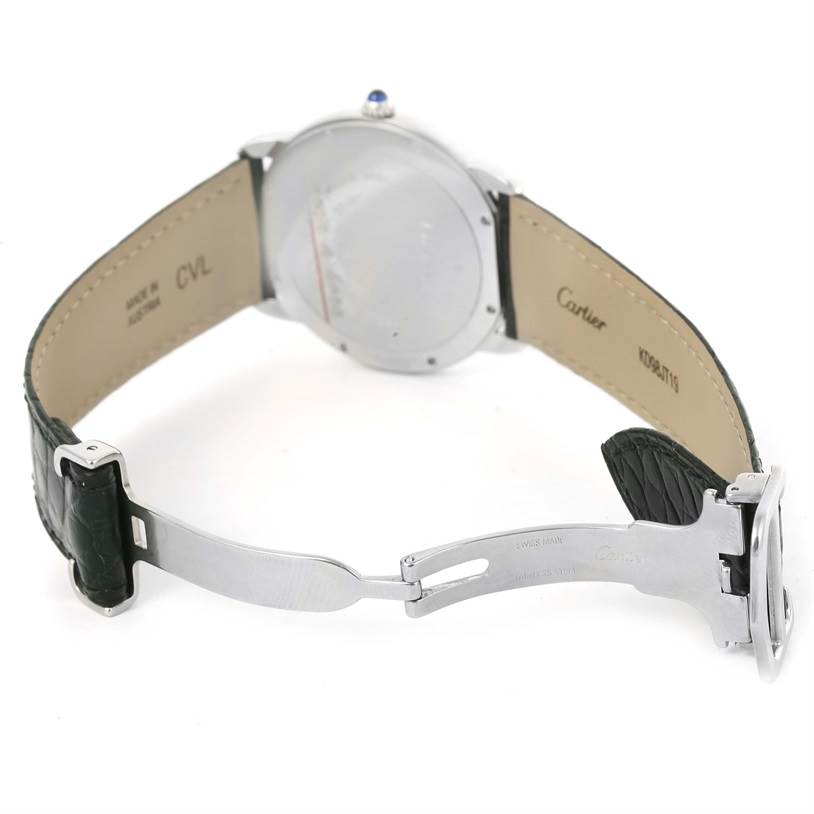 The image shows a Cartier Ronde W6700255 Stainless Steel Silver Dial W6700255 Stainless Steel Silver Dial watch from the back, highlighting the opened clasp, leather strap, and case back.