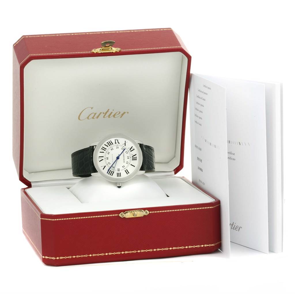 The image shows a Cartier Ronde W6701010 Men's Stainless Steel Silver Dial W6701010 Men's Stainless Steel Silver Dial watch in a red Cartier box with accompanying booklets.