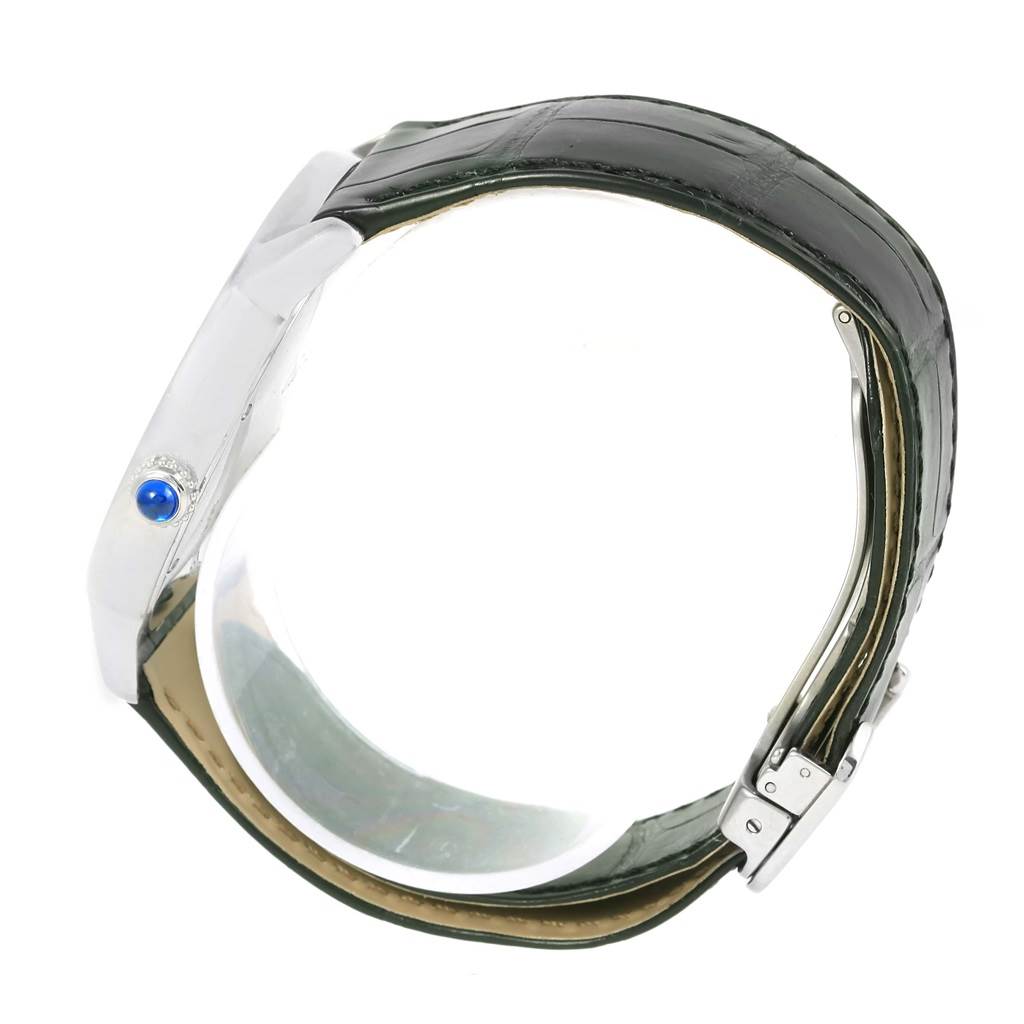 This image shows the side view of the Cartier Ronde W6701010 Men's Stainless Steel Silver Dial W6701010 Men's Stainless Steel Silver Dial watch, highlighting the case, crown, and leather strap.