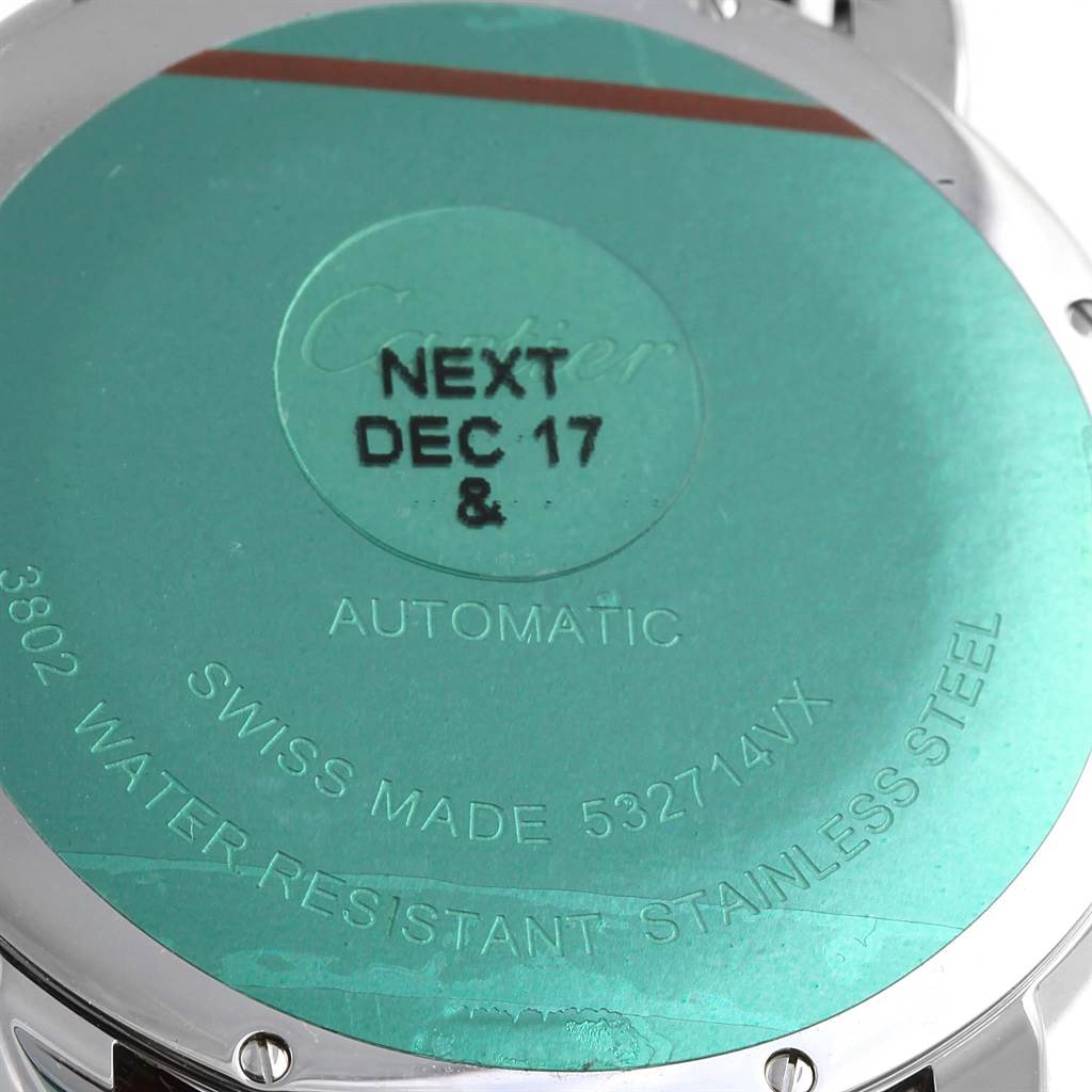 The image shows the back of a Cartier Ronde W6701011 Men
s Stainless Steel Silver Dial W6701011 Men
s Stainless Steel Silver Dial watch, highlighting details like "Automatic," "Swiss Made," and "Water Resistant Stainless Steel."