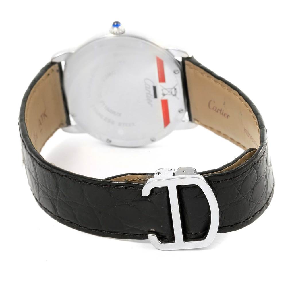 The image shows the back case and black leather strap with a buckle of a Ronde model watch by Cartier.